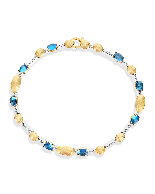 "Azure" Gold, Diamonds and London Blue Topaz tennis bracelet